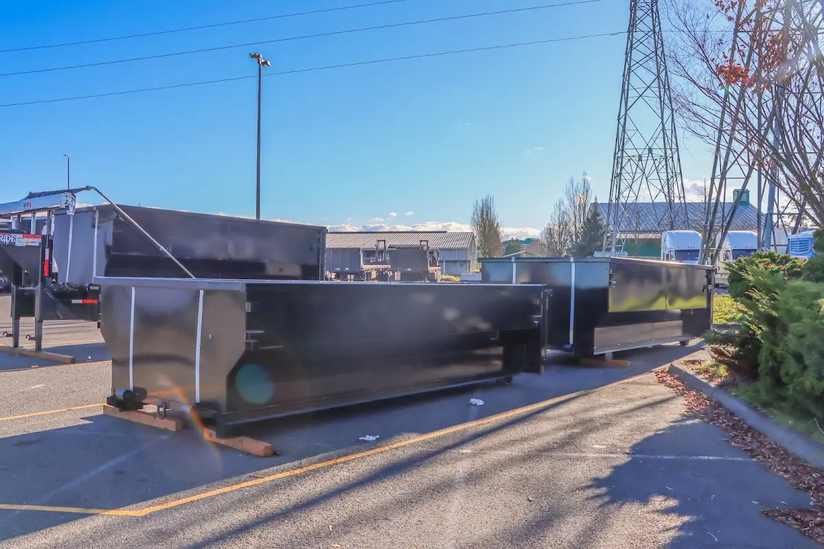 Roll-off dumpster ready for waste disposal at job site for Demolition Dumpster Rental in East Rutherford